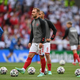 Denmark’s Christian Eriksen warms up with his team ahead of Saturday’s match against Finland.